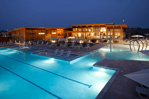 eric highlands clubhouse and pool night